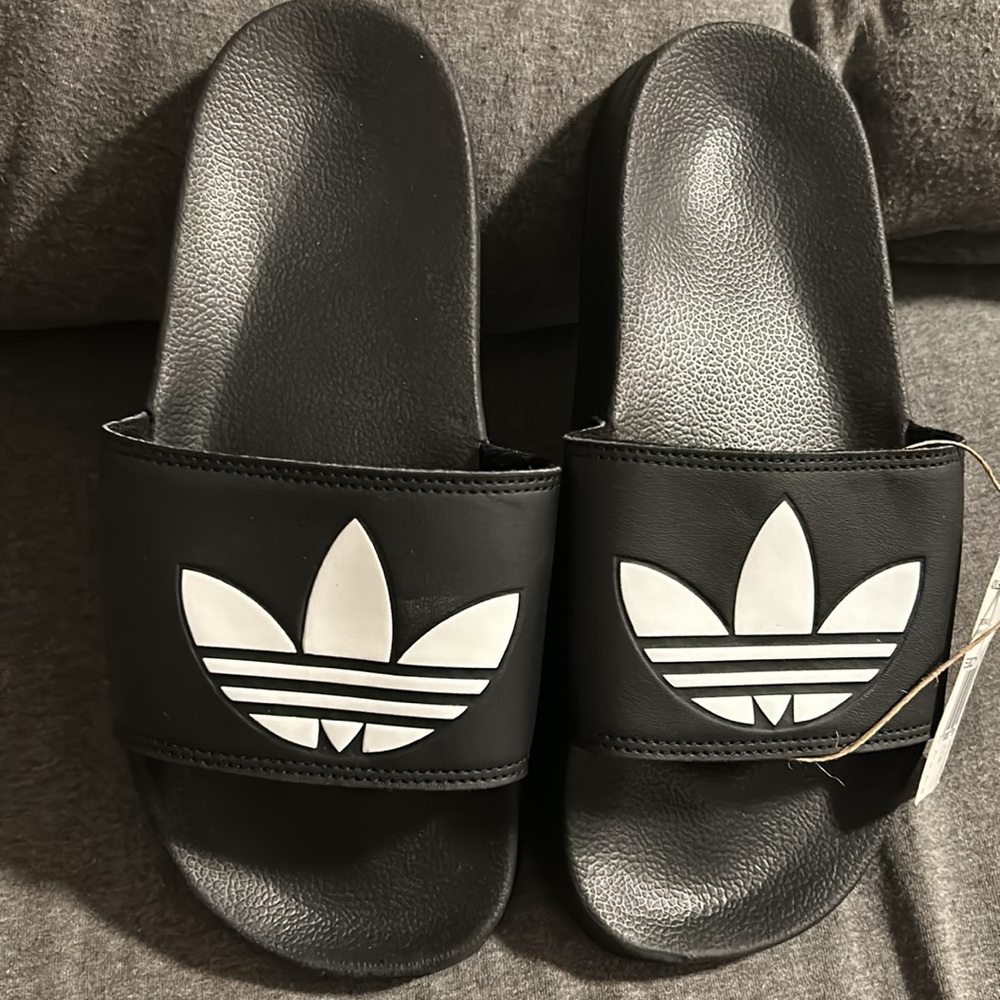 Adidas slides.